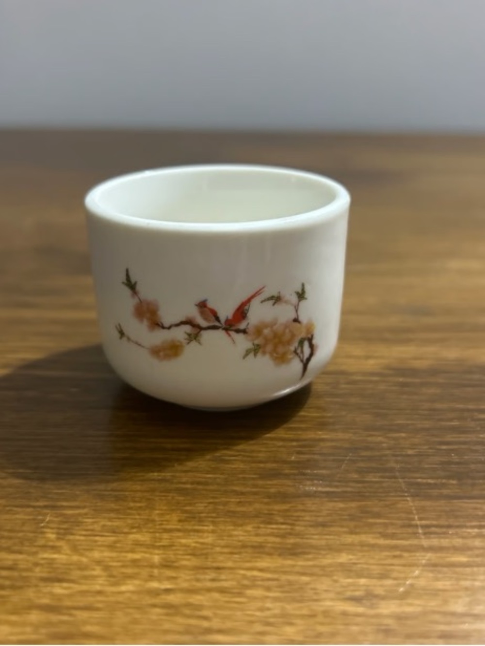 White Porcelain Cup with Red Bird & Floral Motif